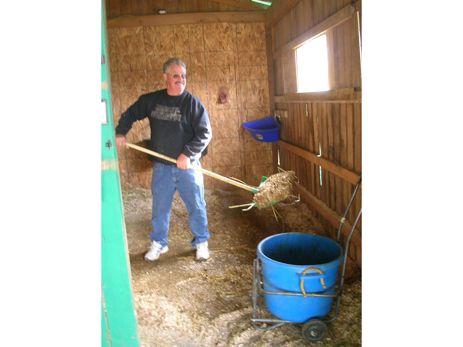 Eric Shoveling Horse Manure
